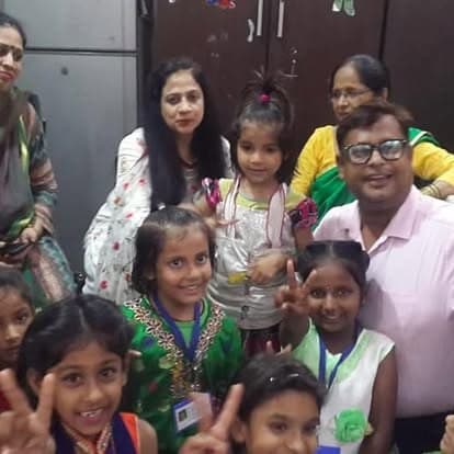 Shubhkarman volunteers visiting children and their caregivers